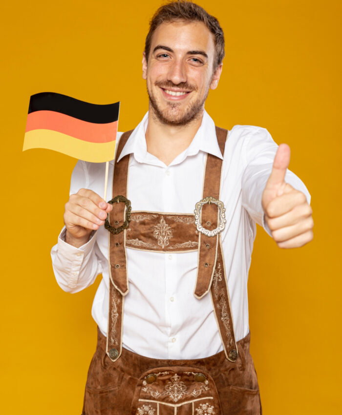 front-view-man-holding-german-flag-2